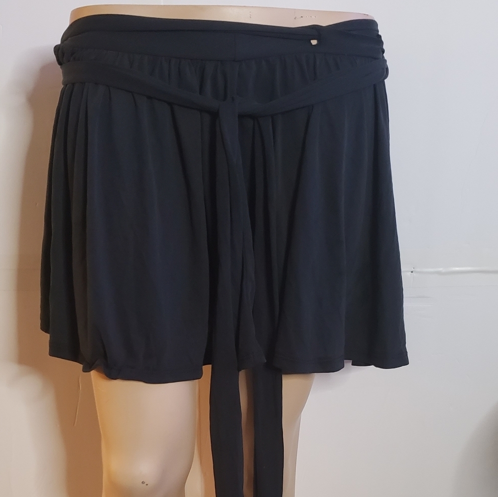 Black wrap around mini skirt.  Free size. Jersey